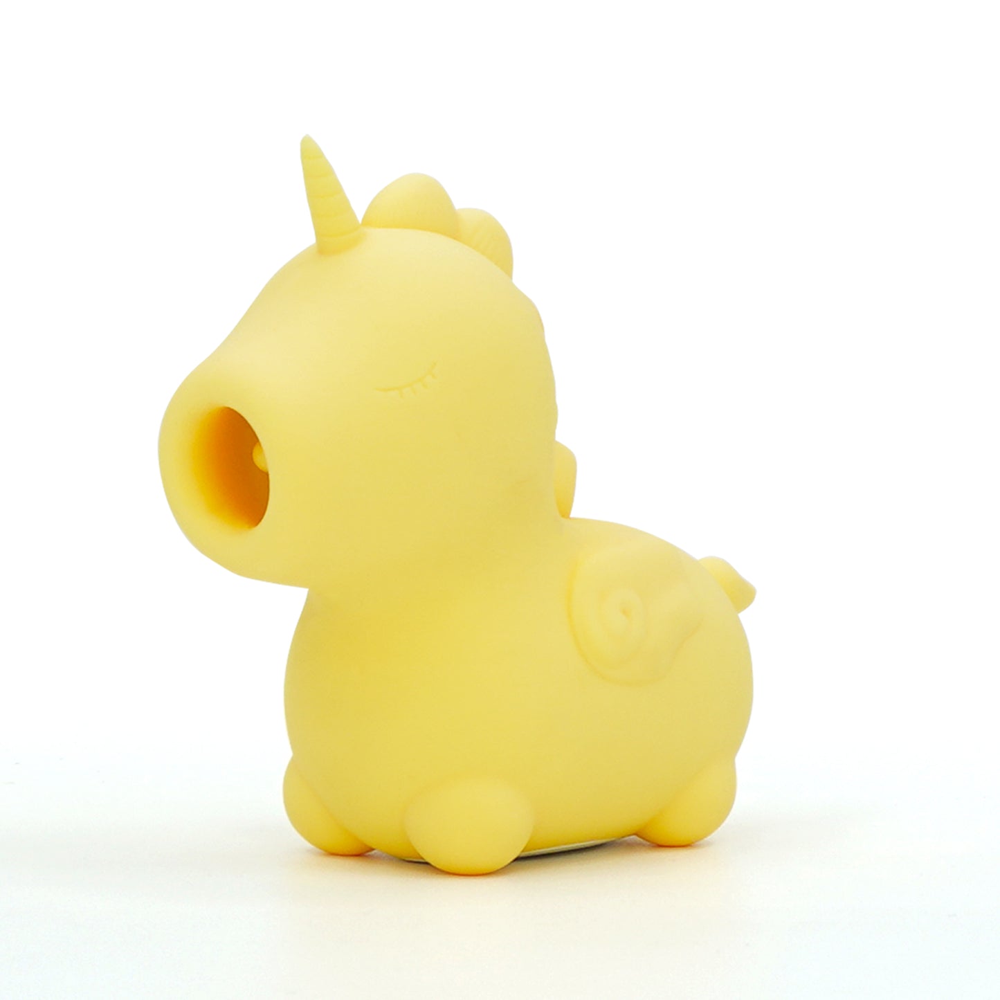 Sunshine yellow Bean Blossom Unihorn clitoral vibrator, facing the left, on a white background