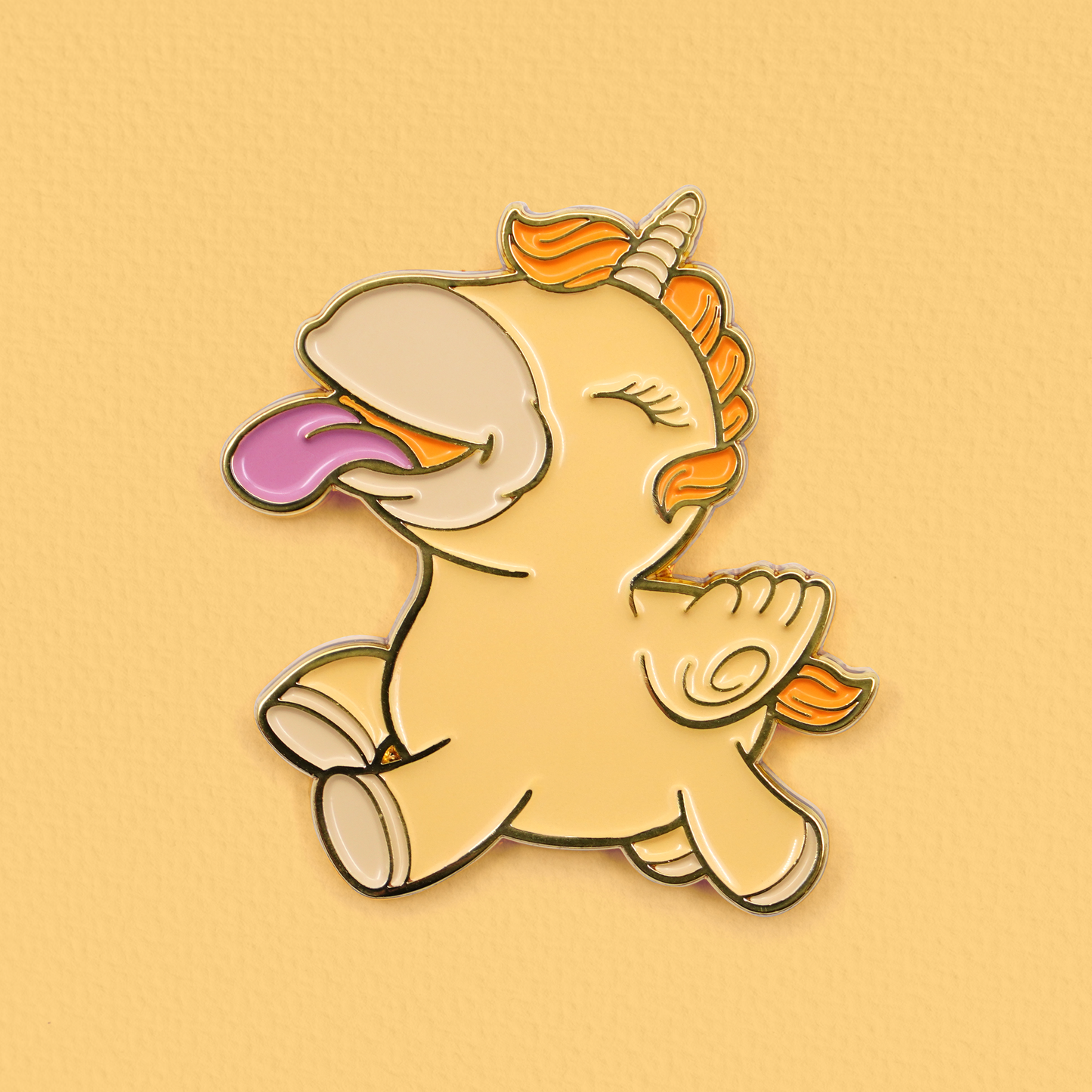Bean Blossom pin badge on a textured yellow background