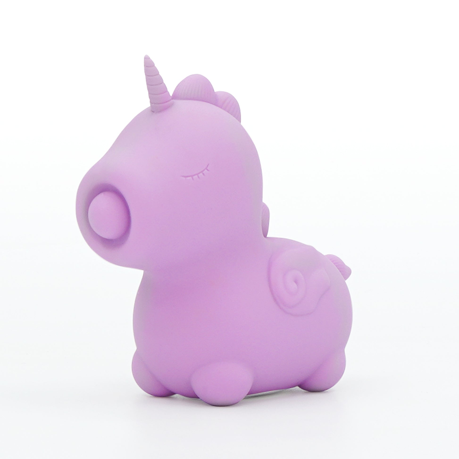 Karma Lilac Unihorn clitoral vibrator facing slightly left, on a white background