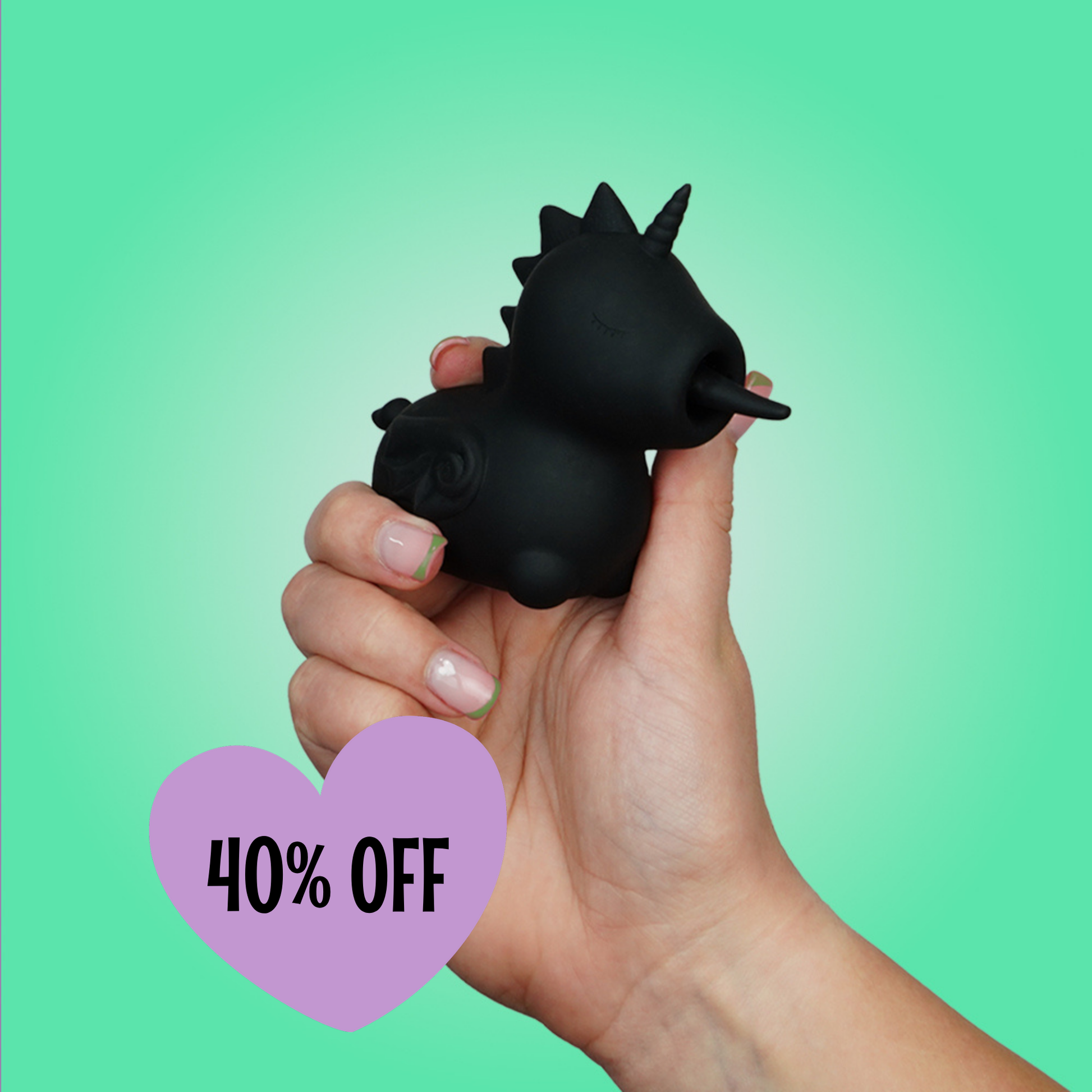 Wild Spirit OG Unihorn held by a hand against a green background, with a lilac heart-shaped label indicating '40% OFF'.
