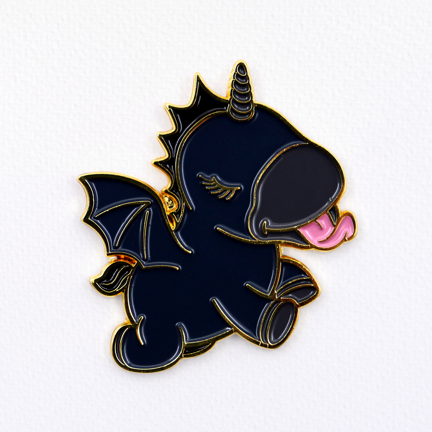 Wild Spirit Unihorn pin badge on a textured white background