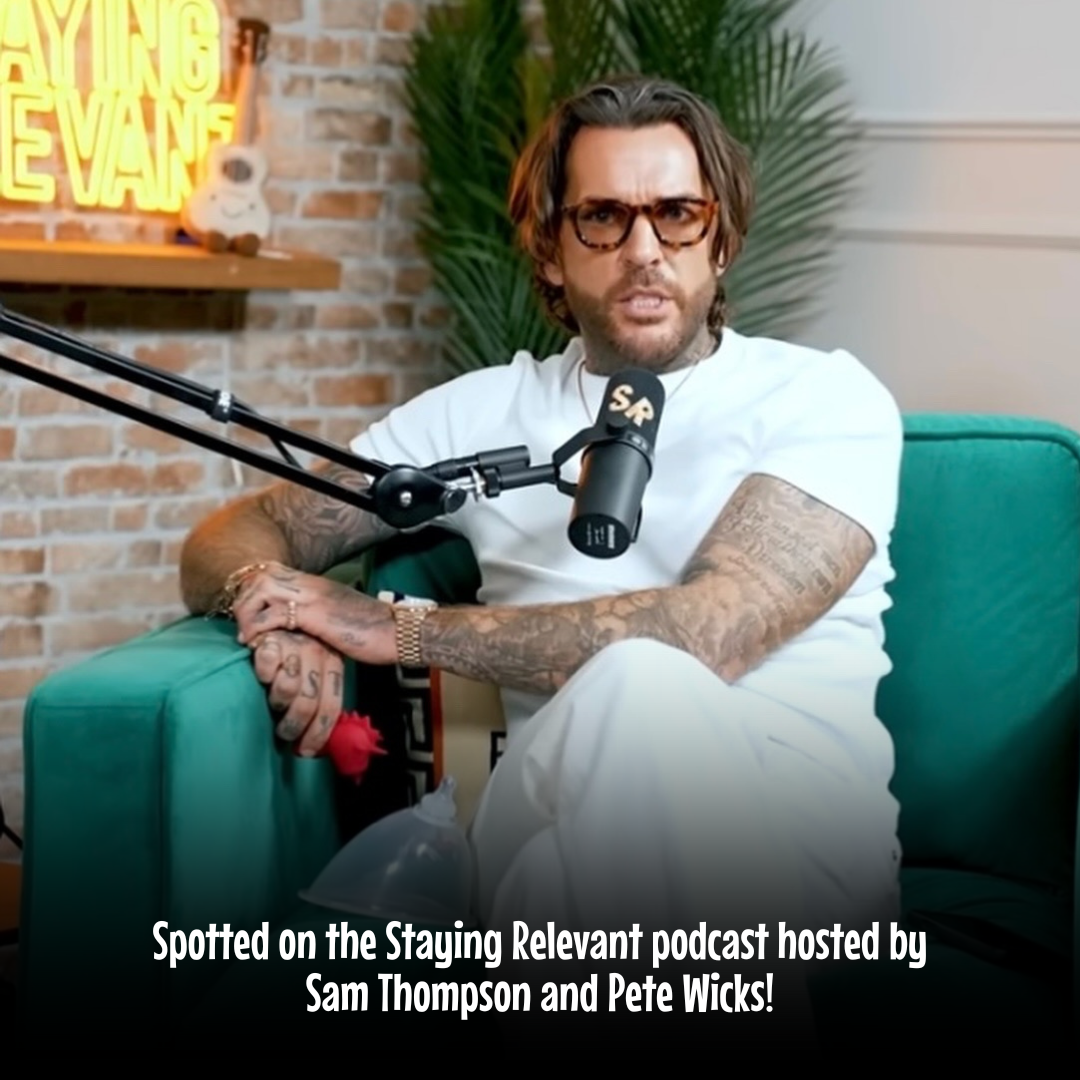 Pete Wicks on a teal sofa with a microphone holding a blaze diablo unihorn in a studio setting